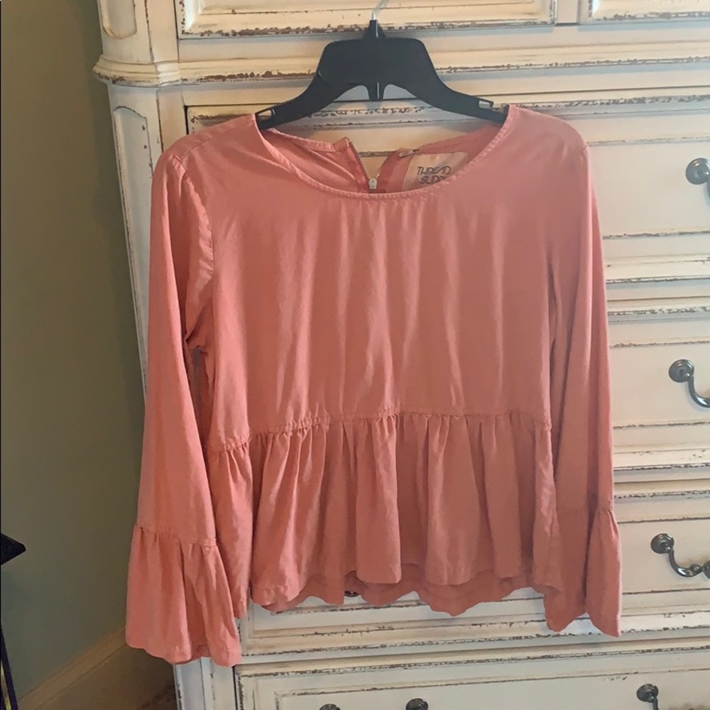 coral colored loose sleeved top